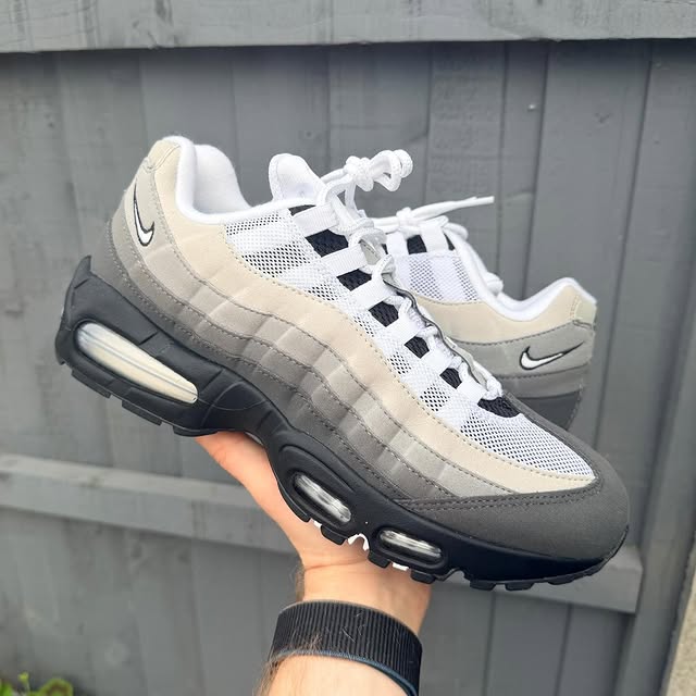 Air Max 95 held up outdoors